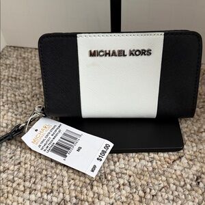 Michael Kors Black and White slim tech wristlet